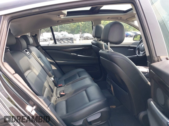 2014 BMW 5 Series GT 535i Gran Turismo xDrive with VIN WBA5M4C56ED183815, listed as a IAAI auction lot 40100547 with 150,358 mi miles and . Bid and sale history available at carsss.com. Image 8.