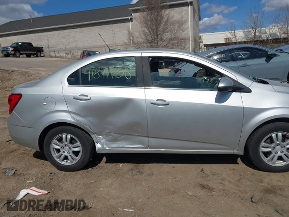 2015 Chevrolet Sonic LT with VIN 1G1JC5SH5F4212883, listed as a IAAI auction lot 41877786 with 91,941 mi miles and . Bid and sale history available at DreamBid. Image 13.