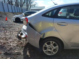 2016 Ford Fiesta SE with VIN 3FADP4BJ4GM106538, listed as a IAAI auction lot 41871345 with 123,847 mi miles. Bid and sale history available at carsss.com. Image 12.