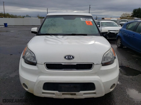 2011 Kia Soul + with VIN KNDJT2A21B7262871, listed as a Copart auction lot 52214145 with 239,808 mi miles and Clean Title. Bid and sale history available at carsss.com. Image 5.