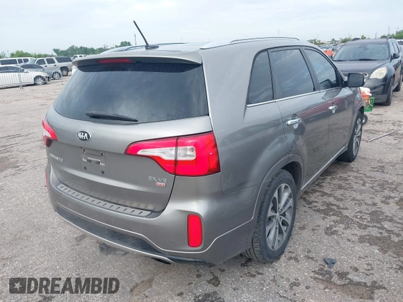 2014 Kia Sorento SX Limited with VIN 5XYKW4A73EG503792, listed as a IAAI auction lot 42684390 with 129,021 mi miles and . Bid and sale history available at DreamBid. Image 4.