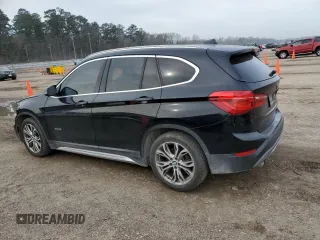 2016 BMW X1 xDrive28i with VIN WBXHT3C33GP883114, listed as a Copart auction lot 46583145 with 87,265 mi miles and Salvage Title. Bid and sale history available at carsss.com. Image 2.