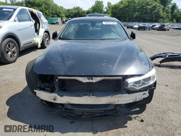 2015 BMW 4 Series 428i xDrive z VIN WBA3T1C57FP820896, wystawiony jako Copart lot #62681495 z przebiegiem 147 357 mil mil oraz Szkoda całkowita • Salvage title. Historia ofert i sprzedaży dostępna na DreamBid. Obrazek 5.