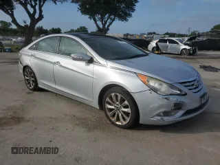 2012 Hyundai Sonata Limited z VIN 5NPEC4AB4CH455218, wystawiony jako Copart lot #60414585 z przebiegiem 195 817 mil mil oraz Szkoda całkowita • Salvage title. Historia ofert i sprzedaży dostępna na DreamBid. Obrazek 4.