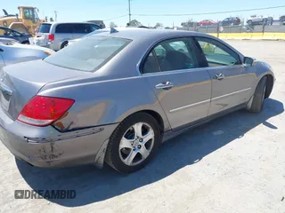 2005 Acura RL z VIN JH4KB16565C002626, wystawiony jako IAAI lot #42522273 z przebiegiem 293 980 mil mil oraz . Historia ofert i sprzedaży dostępna na DreamBid. Obrazek 4.