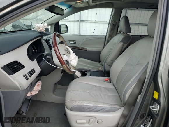 2011 Toyota Sienna XLE AAS with VIN 5TDYK3DC9BS120799, listed as a Copart auction lot 61470045 with 194,422 mi miles and Salvage title. Bid and sale history available at DreamBid. Image 7.