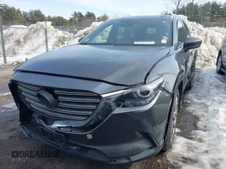 2016 Mazda CX-9 Grand Touring with VIN JM3TCBDY3G0109201, listed as a IAAI auction lot 41705355 with 92,657 mi miles and . Bid and sale history available at carsss.com. Image 6.