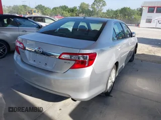 2014 Toyota Camry L with VIN 4T1BF1FK6EU840706, listed as a IAAI auction lot 39109449 with 164,746 mi miles. Bid and sale history available at carsss.com. Image 4.