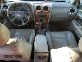 2005 GMC Envoy SLE с VIN 1GKDS13S852261326, выставлен на аукционе Copart как лот 42650025 с пробегом 210 485 миль миль и Списание • Salvage title. История ставок и продаж доступна на DreamBid. Изображение 8.