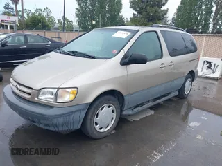 2000 Toyota Sienna LE with VIN 4T3ZF13C5YU315823, listed as a IAAI auction lot 42232438 with 248,010 mi miles and . Bid and sale history available at DreamBid. Image 2.