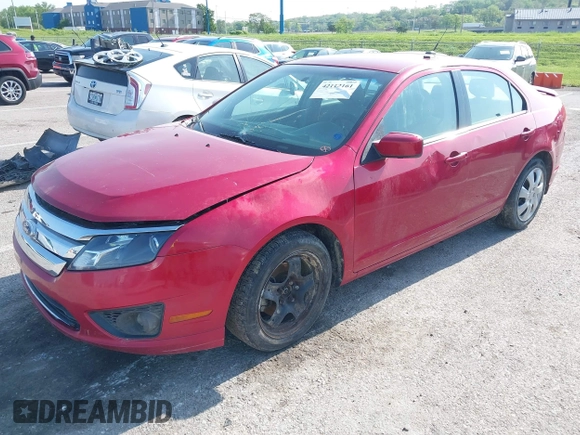 2011 Ford Fusion SE with VIN 3FAHP0HA9BR113305, listed as a IAAI auction lot 42112161 with 217,618 mi miles. Bid and sale history available at carsss.com. Image 2.