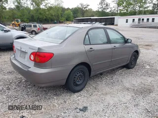2003 Toyota Corolla CE with VIN 1NXBR32EX3Z037333, listed as a IAAI auction lot 42103368 with 205,925 mi miles and . Bid and sale history available at DreamBid. Image 4.