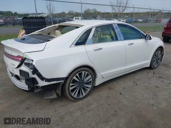2015 Lincoln MKZ с VIN 3LN6L2G96FR615416, выставлен на аукционе IAAI как лот 41962610 с пробегом 61 265 миль миль и . История ставок и продаж доступна на DreamBid. Изображение 4.