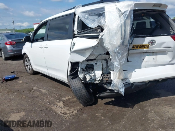 2017 Toyota Sienna LE Auto Access Seat with VIN 5TDKZ3DC7HS896262, listed as a IAAI auction lot 42147163 with 98,219 mi miles and . Bid and sale history available at DreamBid. Image 3.