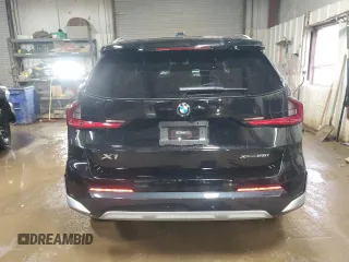 2023 BMW X1 xDrive28i with VIN WBX73EF08P5X85250, listed as a Copart auction lot 50158565 with 7,312 mi miles and Salvage Title. Bid and sale history available at DreamBid. Image 6.