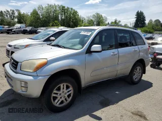 2003 Toyota RAV4 with VIN JTEGH20V936012689, listed as a Copart auction lot 61997965 with 214,693 mi miles and Clean title. Bid and sale history available at DreamBid. Image 1.