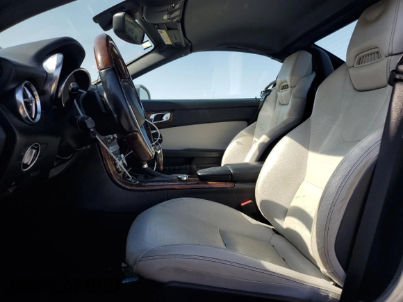 2012 Mercedes-Benz SLK-Class SLK 350 with VIN WDDPK5HA1CF017917, listed as a Copart auction lot 71798664 with 65,676 mi miles and Salvage Title. Bid and sale history available at carsss.com. Image 7.