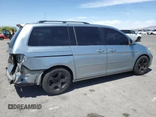 2005 Honda Odyssey Touring z VIN 5FNRL38805B131416, wystawiony jako Copart lot #59157395 z przebiegiem 263 087 mil mil oraz Szkoda całkowita • Salvage title. Historia ofert i sprzedaży dostępna na DreamBid. Obrazek 3.