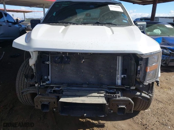 2023 Ford F-150 XL with VIN 1FTEW1CP7PKE28102, listed as a IAAI auction lot 41710708 with 31,563 mi miles. Bid and sale history available at carsss.com. Image 6.