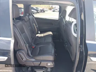 2018 Honda Odyssey Touring with VIN 5FNRL6H8XJB026247, listed as a IAAI auction lot 42298961 with 66,571 mi miles and . Bid and sale history available at DreamBid. Image 8.