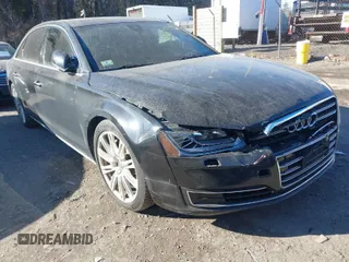 2015 Audi A8 3.0T with VIN WAU3GAFD5FN041189, listed as a IAAI auction lot 41227718 with 117,880 mi miles and . Bid and sale history available at DreamBid. Image 1.
