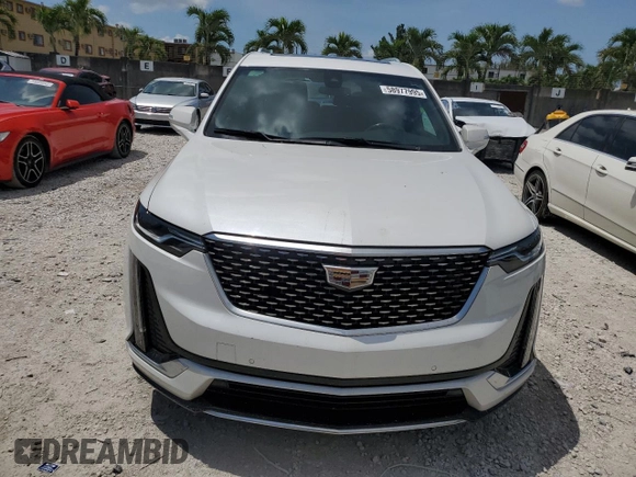 2020 Cadillac XT6 FWD Premium Luxury z VIN 1GYKPCRS7LZ235645, wystawiony jako Copart lot #58977995 z przebiegiem 42 504 mil mil oraz Nie do naprawy • Non repairable. Historia ofert i sprzedaży dostępna na DreamBid. Obrazek 5.