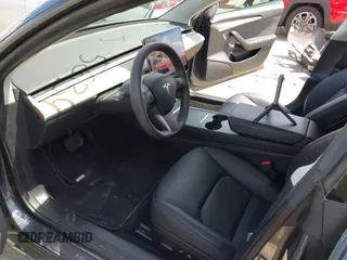 2022 Tesla Model 3 Long Range z VIN 5YJ3E1EB4NF175634, wystawiony jako IAAI lot #42021674 z przebiegiem 39 475 mil mil oraz . Historia ofert i sprzedaży dostępna na DreamBid. Obrazek 5.