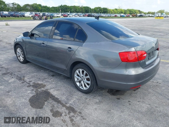 2011 Volkswagen Jetta SE with VIN 3VWDZ7AJ2BM080390, listed as a IAAI auction lot 42723802 with 157,117 mi miles and . Bid and sale history available at DreamBid. Image 3.