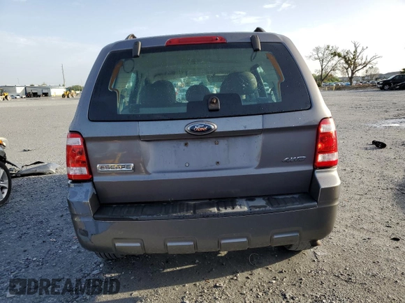 2009 Ford Escape XLS with VIN 1FMCU92749KB94402, listed as a Copart auction lot 60975645 with 171,202 mi miles and Clean title. Bid and sale history available at DreamBid. Image 6.