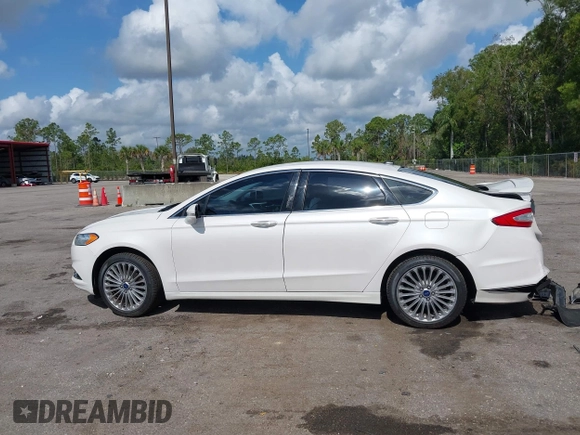 2016 Ford Fusion Titanium with VIN 3FA6P0K96GR400436, listed as a IAAI auction lot 42191256 with 128,447 mi miles and . Bid and sale history available at DreamBid. Image 14.