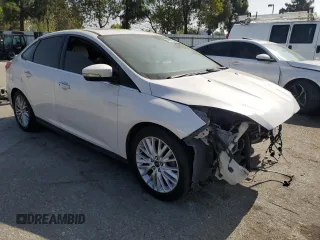 2017 Ford Focus Titanium with VIN 1FADP3J2XHL291606, listed as a Copart auction lot 58268285 with 153,272 mi miles and Salvage title. Bid and sale history available at DreamBid. Image 4.
