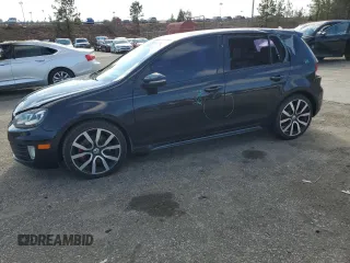 2012 Volkswagen GTI с VIN WVWHV7AJ9CW223157, выставлен на аукционе Copart как лот 86832514 с пробегом 154 012 миль миль и Списание • Salvage title. История ставок и продаж доступна на DreamBid. Изображение 1.