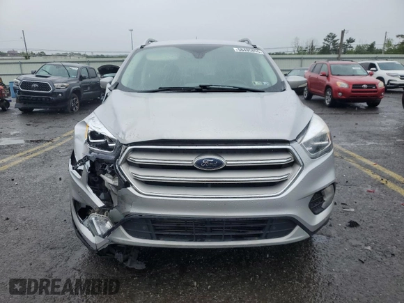 2019 Ford Escape Titanium z VIN 1FMCU9J99KUB44026, wystawiony jako Copart lot #58495855 z przebiegiem 106 361 mil mil oraz Szkoda całkowita • Salvage title. Historia ofert i sprzedaży dostępna na DreamBid. Obrazek 5.