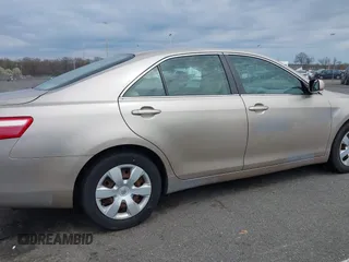 2009 Toyota Camry with VIN 4T1BE46K19U881366, listed as a IAAI auction lot 42039334 with 208,016 mi miles. Bid and sale history available at carsss.com. Image 12.