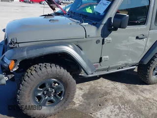 2018 Jeep Wrangler Sport S with VIN 1C4GJXAG4JW283209, listed as a IAAI auction lot 41770557 with 34,041 mi miles and . Bid and sale history available at DreamBid. Image 17.