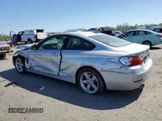 2014 BMW 4 Series 428i xDrive with VIN WBA3N5C51EF716572, listed as a Copart auction lot 52086365 with 209,742 mi miles and Salvage Title. Bid and sale history available at DreamBid. Image 2.