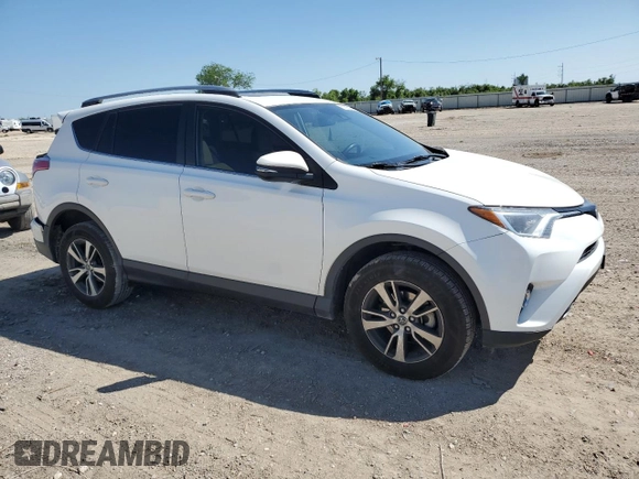 2018 Toyota RAV4 XLE with VIN JTMWFREV3JJ157552, listed as a Copart auction lot 51693335 with 100,907 mi miles and Salvage Title. Bid and sale history available at carsss.com. Image 4.