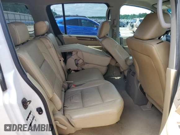2011 Nissan Armada SV z VIN 5N1BA0ND7BN611338, wystawiony jako Copart lot #57069135 z przebiegiem 183 444 mil mil oraz Szkoda całkowita • Salvage title. Historia ofert i sprzedaży dostępna na DreamBid. Obrazek 11.