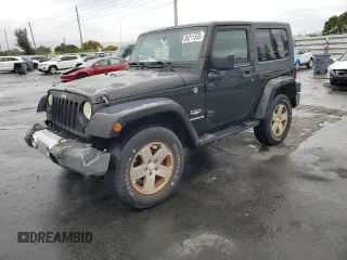 2009 Jeep Wrangler Sahara z VIN 1J4FA54109L702963, wystawiony jako Copart lot #89211555 z przebiegiem 125 138 mil mil oraz Czysty tytuł • Clean title. Historia ofert i sprzedaży dostępna na DreamBid. Obrazek 1.
