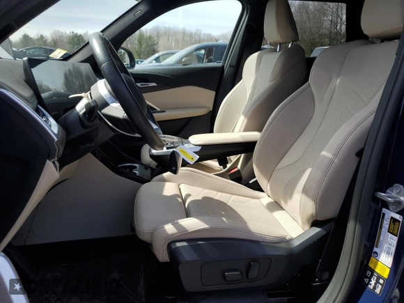 2023 BMW X1 xDrive28i with VIN WBX73EF05P5Y21721, listed as a Copart auction lot 50749295 with 10,633 mi miles and Salvage title. Bid and sale history available at DreamBid. Image 7.