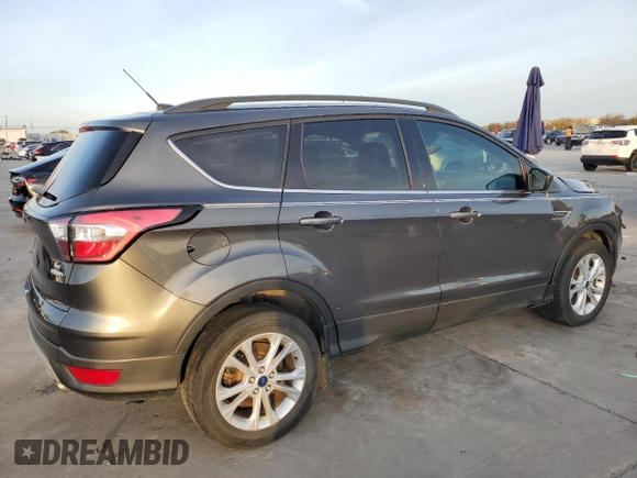 2017 Ford Escape SE with VIN 1FMCU0G91HUE07265, listed as a Copart auction lot 84231444 with 82,990 mi miles and Clean Title. Bid and sale history available at DreamBid. Image 3.