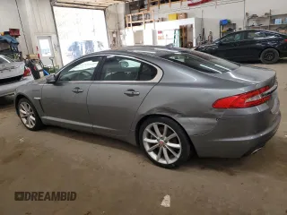 2015 Jaguar XF Portfolio with VIN SAJWJ0FF8F8U65883, listed as a Copart auction lot 55783945 with 133,431 mi miles and Salvage Title. Bid and sale history available at DreamBid. Image 2.