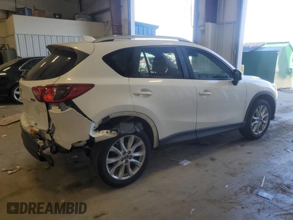 2015 Mazda CX-5 Grand Touring with VIN JM3KE4DY5F0538016, listed as a Copart auction lot 52396685 with 137,272 mi miles and Clean Title. Bid and sale history available at carsss.com. Image 3.