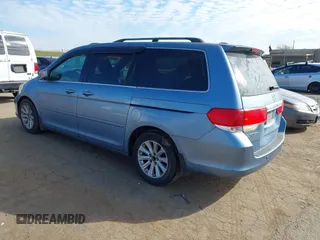 2008 Honda Odyssey Touring with VIN 5FNRL38868B047556, listed as a IAAI auction lot 41581617 with 220,436 mi miles. Bid and sale history available at carsss.com. Image 3.