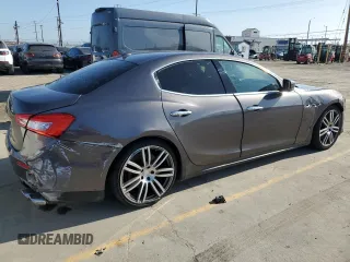 2016 Maserati Ghibli S Q4 z VIN ZAM57RTA8G1173582, wystawiony jako Copart lot #56072145 z przebiegiem Nie podano mil oraz Szkody całkowita. Historia ofert i sprzedaży dostępna na DreamBid. Obrazek 3.