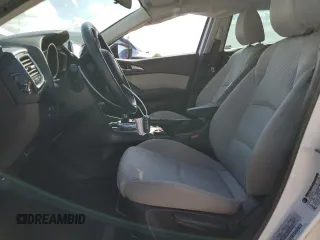 2014 Mazda 3 i Touring z VIN JM1BM1V74E1199435, wystawiony jako Copart lot #80288274 z przebiegiem 148 000 mil mil oraz Szkoda całkowita • Salvage title. Historia ofert i sprzedaży dostępna na DreamBid. Obrazek 7.