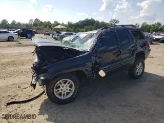 2004 Jeep Grand Cherokee Laredo with VIN 1J4GX48N64C362415, listed as a Copart auction lot 68836614 with 0 mi miles and Salvage Title. Bid and sale history available at carsss.com. Image 1.