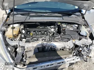 2016 Ford Focus SE z VIN 1FADP3F24GL309119, wystawiony jako Copart lot #62279095 z przebiegiem 117 535 mil mil oraz Szkoda całkowita • Salvage title. Historia ofert i sprzedaży dostępna na DreamBid. Obrazek 11.