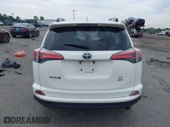 2018 Toyota RAV4 LE with VIN JTMBFREV6JJ210226, listed as a IAAI auction lot 42700312 with Not provided miles and . Bid and sale history available at DreamBid. Image 17.