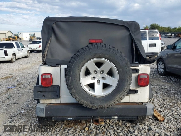 2005 Jeep Wrangler Rubicon with VIN 1J4FA69S45P354546, listed as a Copart auction lot 69804164 with 92,183 mi miles and Clean Title. Bid and sale history available at carsss.com. Image 6.